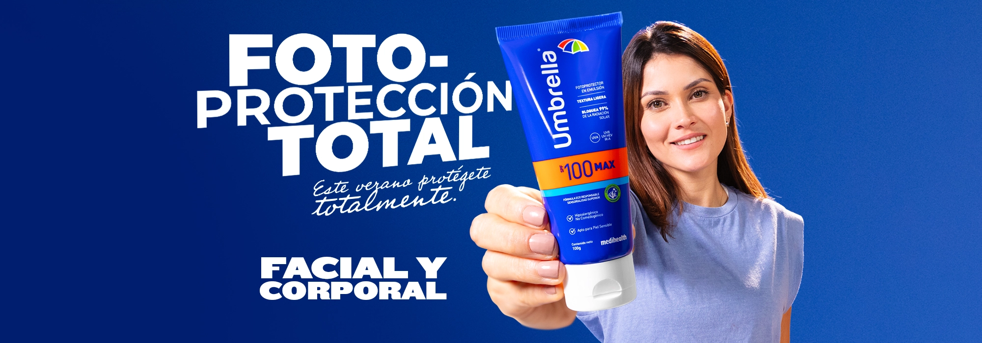 Mujer sonriente sostiene protector solar Umbrella Max SPF 100 en primer plano, con fondo azul y texto ‘Fotoprotección total. Este verano protégente totalmente. Facial y corporal’.